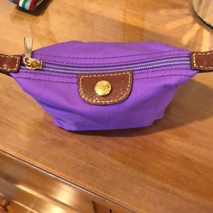 Purple Longchamp change purse